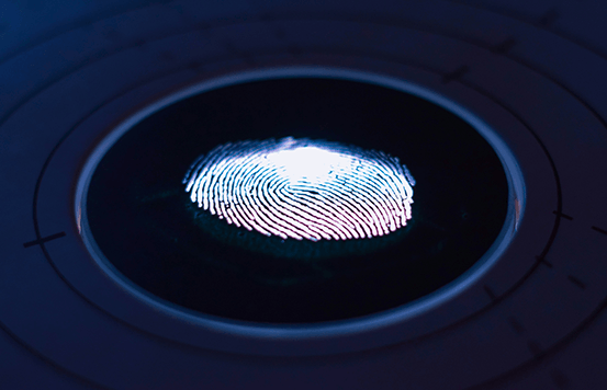 Fingerprint on a black background.