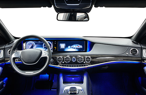 A modern car dashboard with infotainment screen.